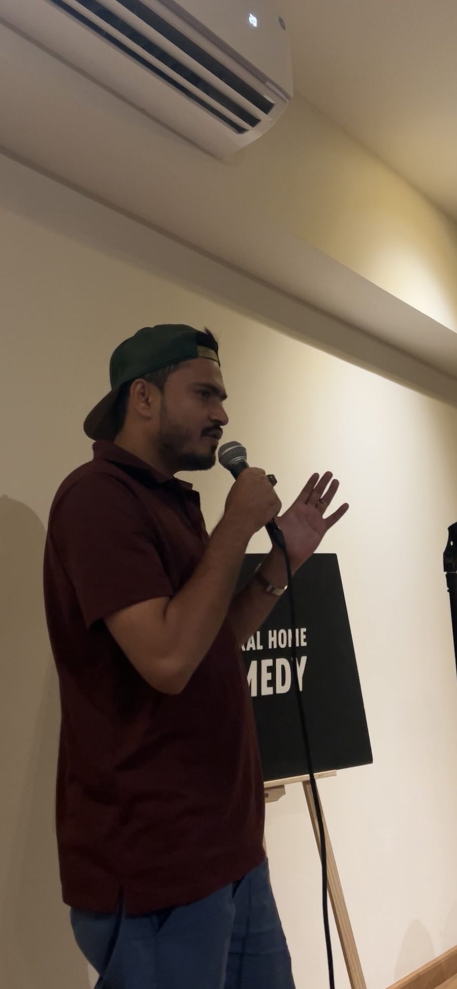 Abdullah AKJhaluk Khan speaking on stage